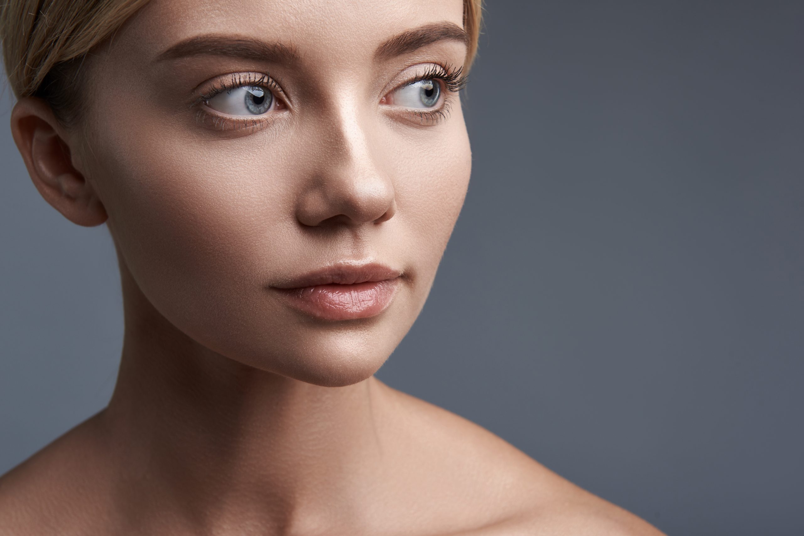 Laconic portrait of calm woman looking into the distance